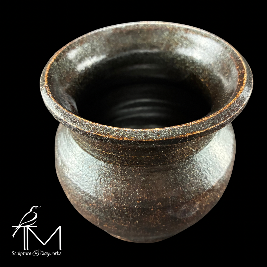 Shapely stoneware vase with Cosmic Tea glaze