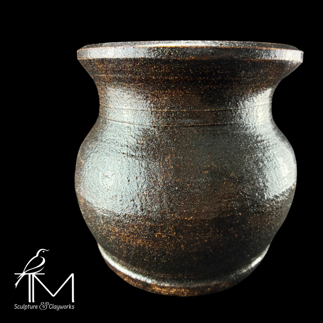 Shapely stoneware vase with Cosmic Tea glaze