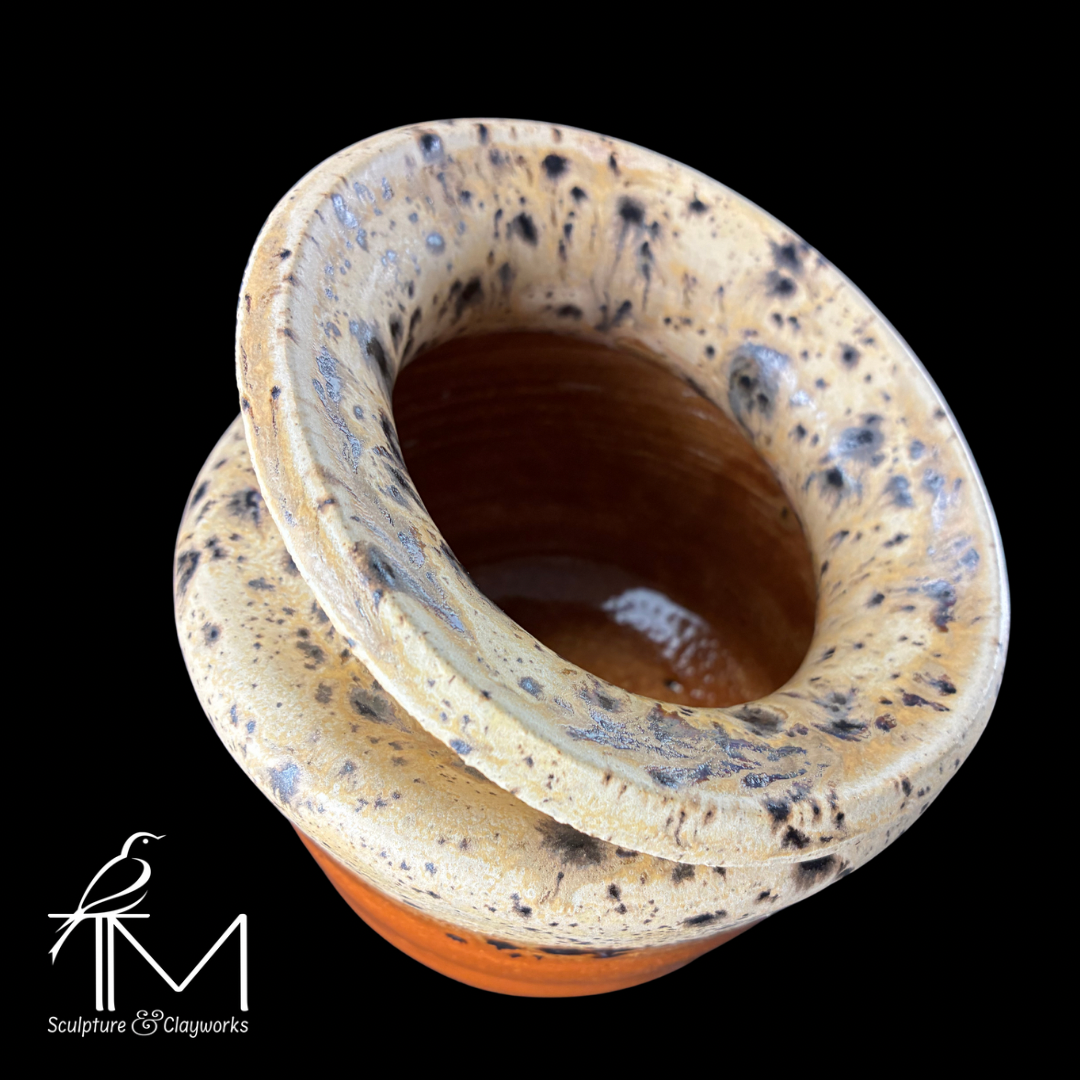 Collapsed form vessel with Winter Wood and milk chocolate glaze