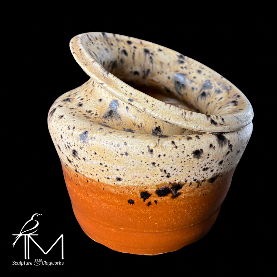Collapsed form vessel with Winter Wood and milk chocolate glaze