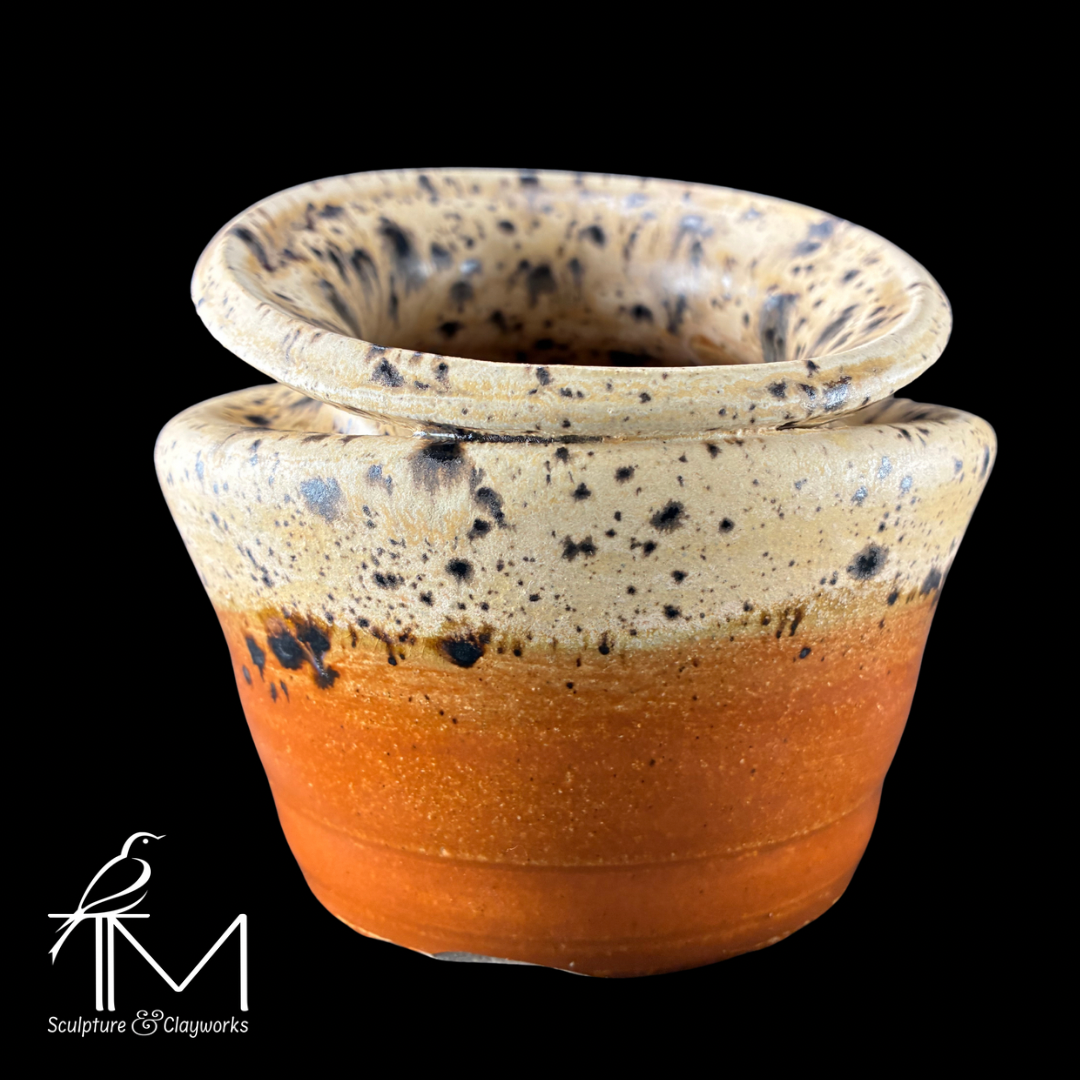 Collapsed form vessel with Winter Wood and milk chocolate glaze