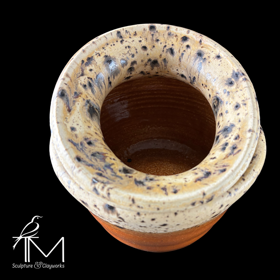 Collapsed form vessel with Winter Wood and milk chocolate glaze