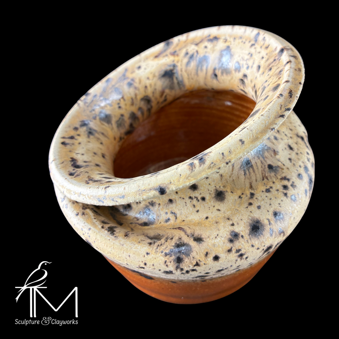 Collapsed form vessel with Winter Wood and milk chocolate glaze